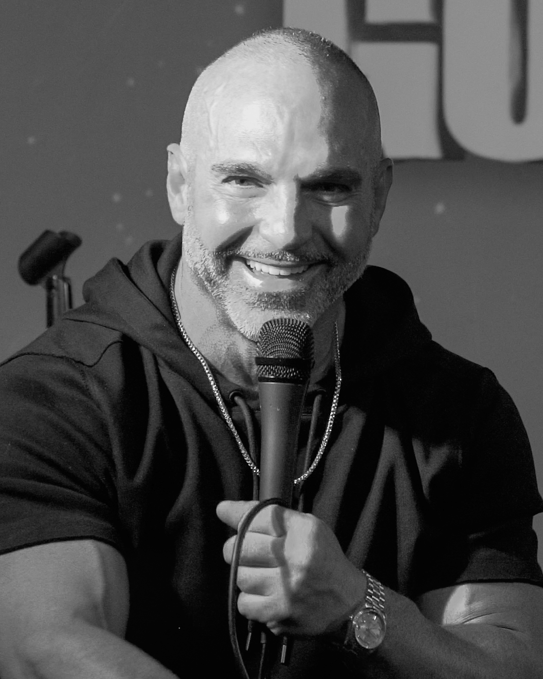 Joe Gorga performing live on stage during comedy tour show in Long Island New York